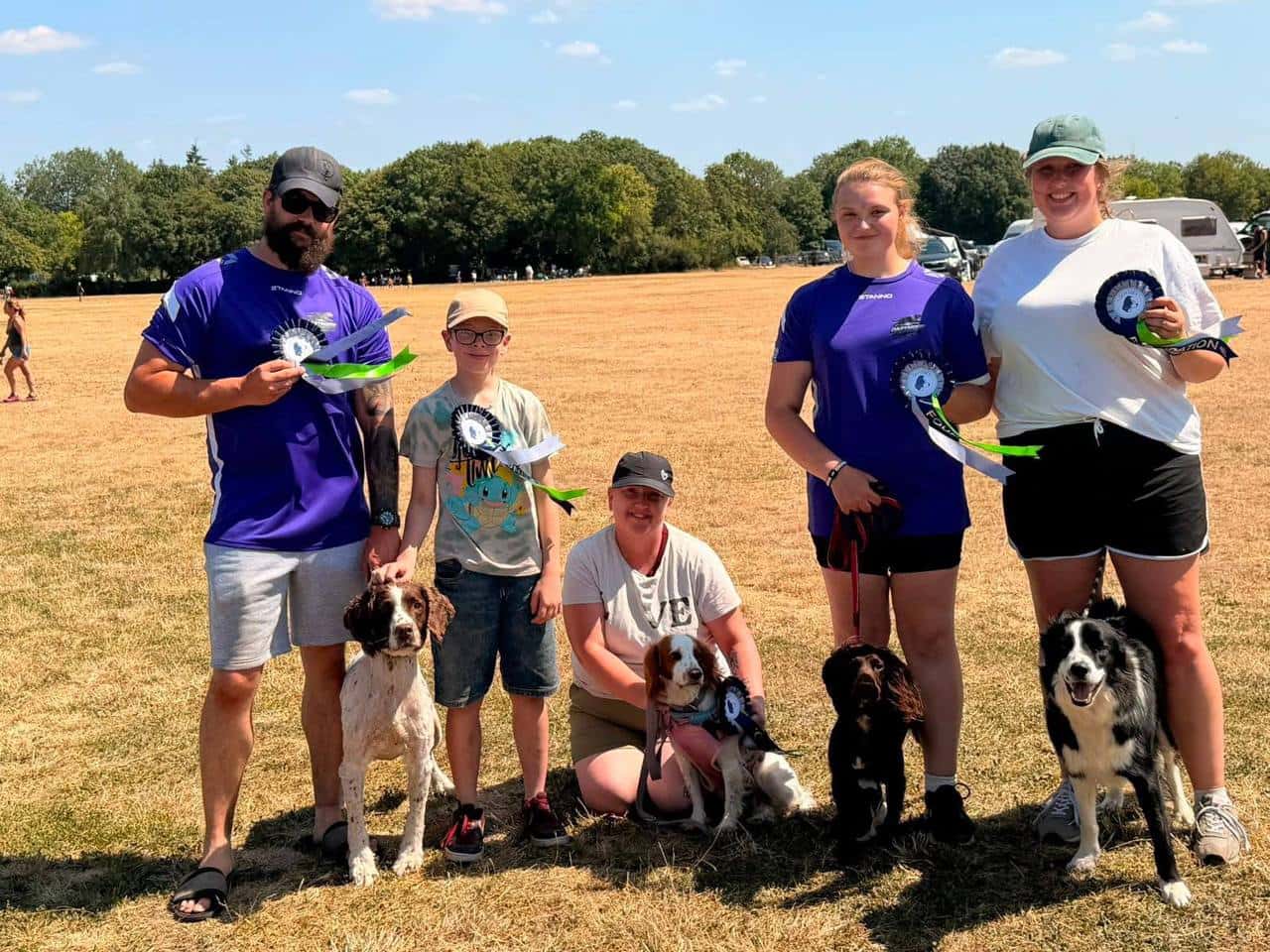 The Dartmoor Daredevils team with their dogs and rosettes