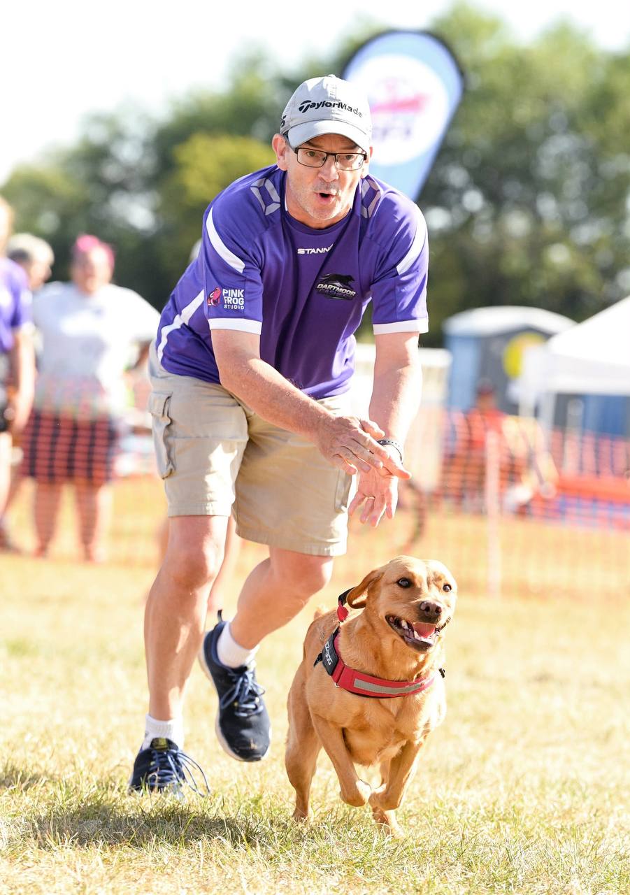 Chris running with Tilley